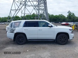 2016 Chevrolet Tahoe Commercial z VIN 1GNSKFEC1GR249946, wystawiony jako IAAI lot #42610587 z przebiegiem Nie podano mil oraz . Historia ofert i sprzedaży dostępna na DreamBid. Obrazek 14.