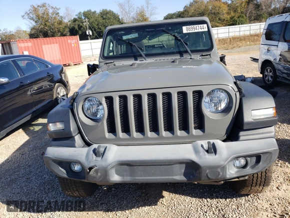 2020 Jeep Wrangler Willys with VIN 1C4GJXAG5LW307083, listed as a Copart auction lot 86994744 with 28,873 mi miles and Salvage title. Bid and sale history available at DreamBid. Image 5.