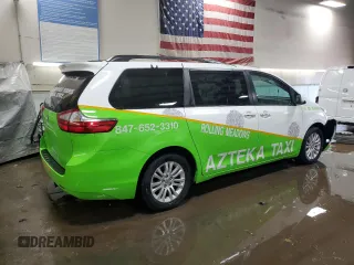 2015 Toyota Sienna XLE с VIN 5TDYK3DC9FS601304, выставлен на аукционе Copart как лот 51118295 с пробегом 153 121 миль миль и Списание • Salvage title. История ставок и продаж доступна на DreamBid. Изображение 3.