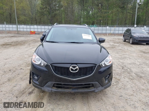 2014 Mazda CX-5 Touring with VIN JM3KE2CY7E0341658, listed as a IAAI auction lot 41915807 with 99,287 mi miles. Bid and sale history available at carsss.com. Image 13.