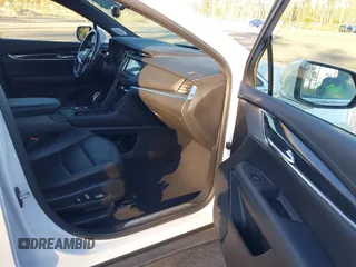2021 Cadillac XT5 AWD Premium Luxury with VIN 1GYKNDRS3MZ115273, listed as a IAAI auction lot 41228531 with 46,556 mi miles. Bid and sale history available at carsss.com. Image 5.
