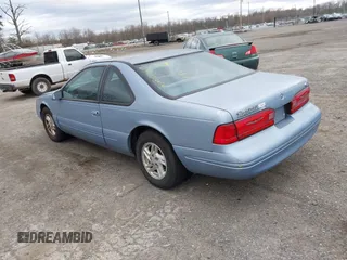 1997 Ford Thunderbird LX with VIN 1FALP62W2VH105702, listed as a IAAI auction lot 41713980 with 90,775 mi miles and . Bid and sale history available at DreamBid. Image 3.