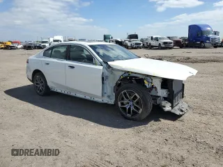 2024 BMW i5 eDrive40 with VIN WBY33FK05RCR50188, listed as a Copart auction lot 52953195 with 423 mi miles and Salvage title. Bid and sale history available at DreamBid. Image 4.