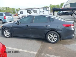 2016 Kia Optima LX with VIN KNAGT4L33G5107444, listed as a IAAI auction lot 41971006 with 174,997 mi miles. Bid and sale history available at carsss.com. Image 14.