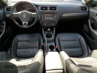 2014 Volkswagen Jetta TDI w/Premium with VIN 3VW3L7AJ4EM273755, listed as a Copart auction lot 52389795 with 184,586 mi miles and Salvage title. Bid and sale history available at DreamBid. Image 8.