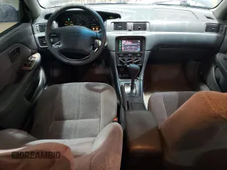 2000 Toyota Camry CE z VIN 4T1BG22K7YU744080, wystawiony jako Copart lot #56675105 z przebiegiem 226 154 mil mil oraz Szkoda całkowita • Salvage title. Historia ofert i sprzedaży dostępna na DreamBid. Obrazek 8.