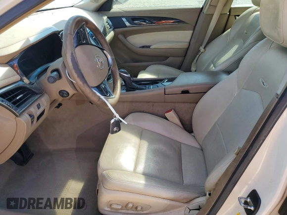 2014 Cadillac CTS Luxury RWD with VIN 1G6AR5S33E0154789, listed as a Copart auction lot 50395035 with 148,033 mi miles and Salvage Title. Bid and sale history available at carsss.com. Image 7.
