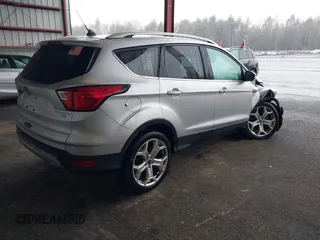 2019 Ford Escape Titanium with VIN 1FMCU9J9XKUA37695, listed as a IAAI auction lot 41868388 with 50,095 mi miles. Bid and sale history available at carsss.com. Image 4.