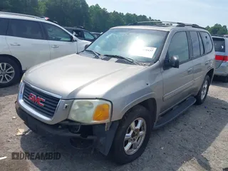 2003 GMC Envoy SLE z VIN 1GKDT13S632213799, wystawiony jako IAAI lot #42470437 z przebiegiem 289 728 mil mil oraz . Historia ofert i sprzedaży dostępna na DreamBid. Obrazek 2.