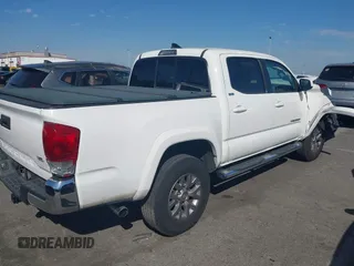 2017 Toyota Tacoma SR5 with VIN 5TFAZ5CN9HX039333, listed as a IAAI auction lot 41701962 with 102,737 mi miles and . Bid and sale history available at carsss.com. Image 4.