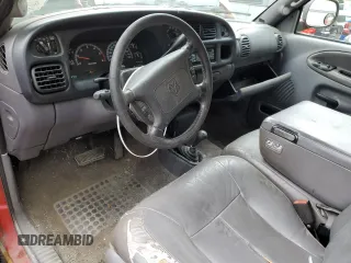 2000 Dodge 2500 z VIN 1B7KF23Z6YJ187490, wystawiony jako Copart lot #57873375 z przebiegiem 238 769 mil mil oraz Szkody całkowita. Historia ofert i sprzedaży dostępna na DreamBid. Obrazek 8.