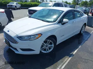 2018 Ford Fusion S z VIN 3FA6P0UU1JR204607, wystawiony jako IAAI lot #41985269 z przebiegiem 116 517 mil mil oraz . Historia ofert i sprzedaży dostępna na DreamBid. Obrazek 18.
