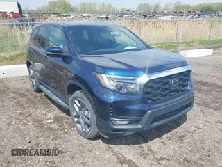 2023 Honda Passport EX-L z VIN 5FNYF8H57PB004896, wystawiony jako IAAI lot #42184509 z przebiegiem 25 950 mil mil oraz . Historia ofert i sprzedaży dostępna na DreamBid. Obrazek 1.