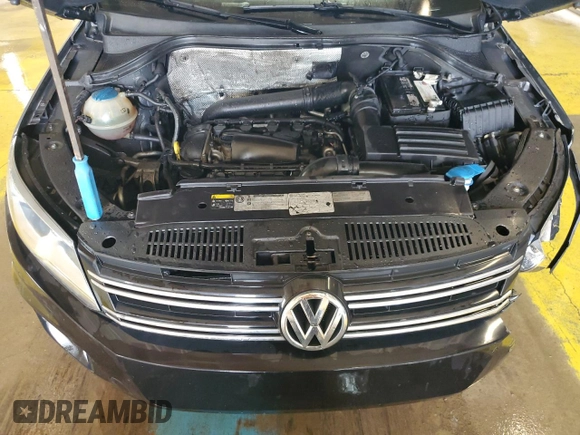 2016 Volkswagen Tiguan S with VIN WVGAV7AX8GW584211, listed as a Copart auction lot 57489065 with 140,420 mi miles and Clean title. Bid and sale history available at DreamBid. Image 12.