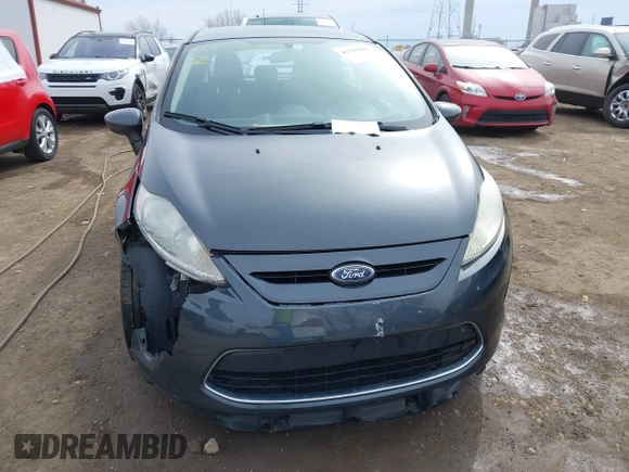 2011 Ford Fiesta SE with VIN 3FADP4EJ6BM137939, listed as a IAAI auction lot 41705008 with 161,166 mi miles. Bid and sale history available at carsss.com. Image 12.