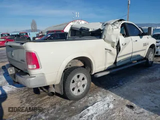 2016 Ram 2500 Laramie with VIN 3C6UR5NLXGG205295, listed as a IAAI auction lot 41445788 with 161,199 mi miles and . Bid and sale history available at DreamBid. Image 4.