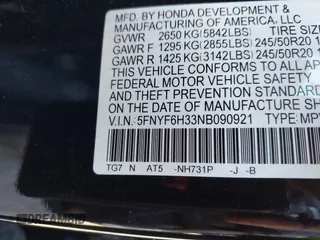 2022 Honda Pilot Sport with VIN 5FNYF6H33NB090921, listed as a IAAI auction lot 41371305 with 29,415 mi miles and . Bid and sale history available at DreamBid. Image 9.
