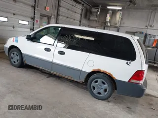 2006 Ford Freestar Cargo with VIN 2FTZA54666BA14556, listed as a IAAI auction lot 42103437 with 147,998 mi miles. Bid and sale history available at carsss.com. Image 3.