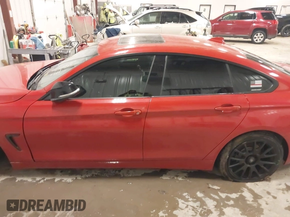 2015 BMW 4 Series 428i with VIN WBA4A9C52FGL85049, listed as a IAAI auction lot 41649475 with 100,443 mi miles and . Bid and sale history available at DreamBid. Image 14.