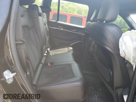 2022 Jeep Grand Cherokee Trailhawk with VIN 1C4RJHCG7N8574289, listed as a Copart auction lot 56333165 with 23,522 mi miles and Salvage title. Bid and sale history available at DreamBid. Image 11.