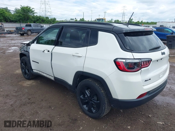 2021 Jeep Compass Altitude with VIN 3C4NJDBBXMT586529, listed as a IAAI auction lot 42296016 with 71,789 mi miles and . Bid and sale history available at DreamBid. Image 3.