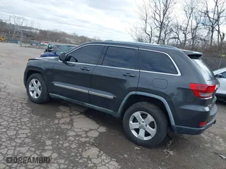 2011 Jeep Grand Cherokee Laredo with VIN 1J4RR4GG7BC721483, listed as a IAAI auction lot 41810180 with 181,558 mi miles. Bid and sale history available at carsss.com. Image 3.