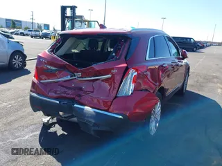 2019 Cadillac XT5 Premium Luxury FWD with VIN 1GYKNERS4KZ174349, listed as a IAAI auction lot 41614364 with 104,979 mi miles and . Bid and sale history available at DreamBid. Image 13.