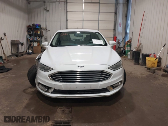 2017 Ford Fusion Titanium with VIN 3FA6P0K98HR124178, listed as a IAAI auction lot 42207938 with 89,352 mi miles and . Bid and sale history available at DreamBid. Image 12.