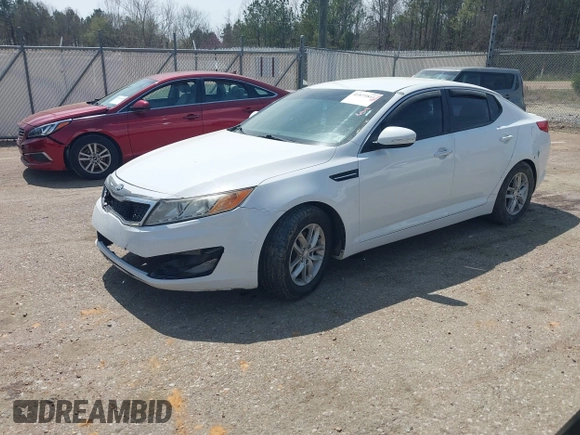 2012 Kia Optima LX with VIN 5XXGM4A77CG050600, listed as a IAAI auction lot 41875841 with 294,134 mi miles and . Bid and sale history available at carsss.com. Image 2.