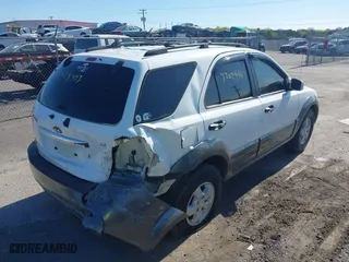 2007 Kia Sorento EX with VIN KNDJC736575664988, listed as a IAAI auction lot 42029443 with 210,971 mi miles. Bid and sale history available at carsss.com. Image 4.