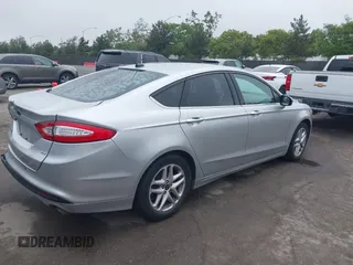 2016 Ford Fusion SE z VIN 3FA6P0H76GR385328, wystawiony jako IAAI lot #42408631 z przebiegiem 127 293 mil mil oraz . Historia ofert i sprzedaży dostępna na DreamBid. Obrazek 4.