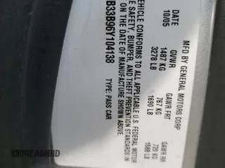 2006 Pontiac Solstice z VIN 1G2MB33B96Y104138, wystawiony jako Copart lot #48909975 z przebiegiem Nie podano mil oraz Szkody całkowita. Historia ofert i sprzedaży dostępna na DreamBid. Obrazek 14.