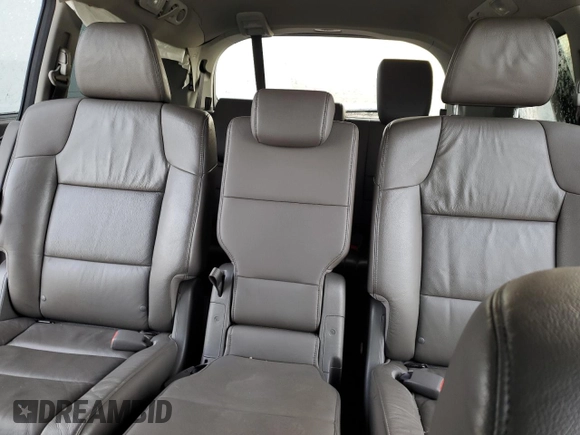 2012 Honda Odyssey Touring with VIN 5FNRL5H91CB047042, listed as a Copart auction lot 82248004 with 123,445 mi miles and Salvage Title. Bid and sale history available at carsss.com. Image 10.