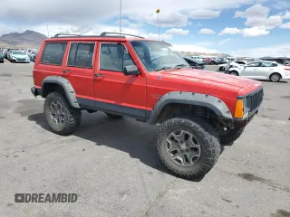 1996 Jeep Cherokee Sport with VIN 1J4FJ68S6TL213886, listed as a Copart auction lot 51462275 with 215,091 mi miles and Salvage title. Bid and sale history available at DreamBid. Image 4.
