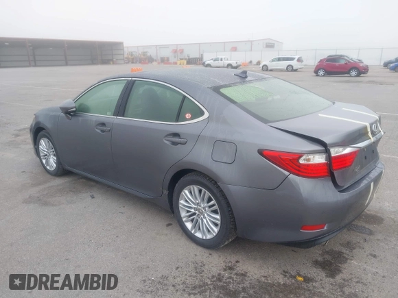 2014 Lexus ES 330 z VIN JTHBK1GGXE2148484, wystawiony jako IAAI lot #42186766 z przebiegiem 117 217 mil mil oraz . Historia ofert i sprzedaży dostępna na DreamBid. Obrazek 3.