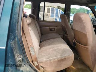 1995 Ford Explorer Eddie Bauer z VIN 1FMDU32X9SUC06085, wystawiony jako Copart lot #55322785 z przebiegiem 248 871 mil mil oraz Szkoda całkowita • Salvage title. Historia ofert i sprzedaży dostępna na DreamBid. Obrazek 11.