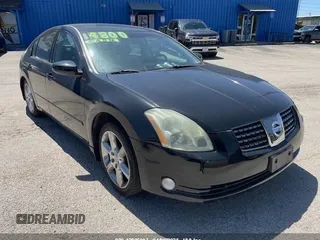 2004 Nissan Maxima SL with VIN 1N4BA41E94C883548, listed as a IAAI auction lot 42006917 with 158,277 mi miles. Bid and sale history available at carsss.com. Image 1.