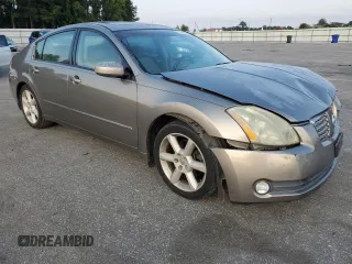 2004 Nissan Maxima SE with VIN 1N4BA41E24C878448, listed as a Copart auction lot 72596984 with 329,525 mi miles and Salvage Title. Bid and sale history available at carsss.com. Image 4.