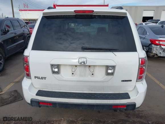 2006 Honda Pilot EX-L with VIN 2HKYF18576H517590, listed as a IAAI auction lot 41802601 with 233,833 mi miles. Bid and sale history available at carsss.com. Image 16.