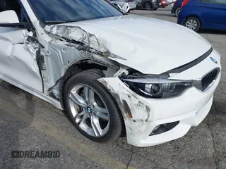 2019 BMW 4 Series 430i with VIN WBA4W3C5XKAF93081, listed as a IAAI auction lot 41689477 with 87,936 mi miles and . Bid and sale history available at DreamBid. Image 12.
