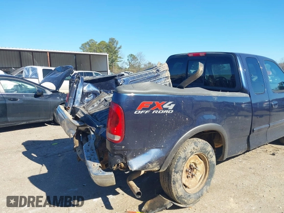 2003 Ford F-150 XL with VIN 1FTRX18L73NB36799, listed as a IAAI auction lot 41317602 with 270,075 mi miles. Bid and sale history available at carsss.com. Image 14.