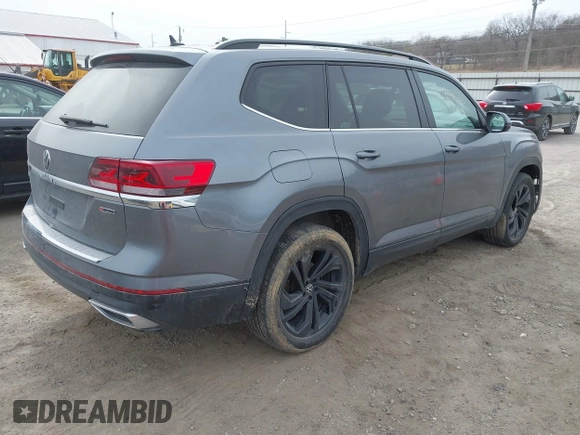 2021 Volkswagen Atlas SE with VIN 1V2KR2CA0MC570498, listed as a IAAI auction lot 41807676 with 56,434 mi miles and . Bid and sale history available at DreamBid. Image 4.