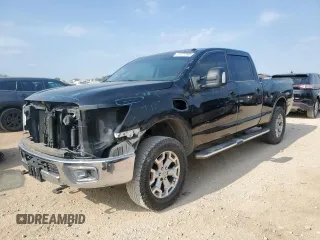 2016 Nissan Titan Platinum Reserve с VIN 1N6BA1F42GN506140, выставлен на аукционе Copart как лот 57171395 с пробегом 141 295 миль миль и Списание • Salvage title. История ставок и продаж доступна на DreamBid. Изображение 1.