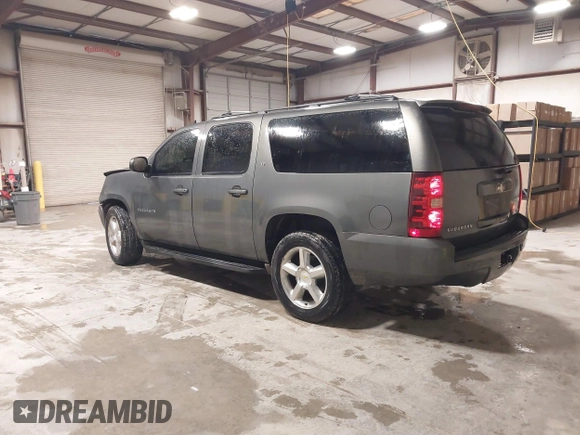 2011 Chevrolet Suburban LT with VIN 1GNSCJE0XBR180270, listed as a IAAI auction lot 41531193 with 202,493 mi miles. Bid and sale history available at carsss.com. Image 3.