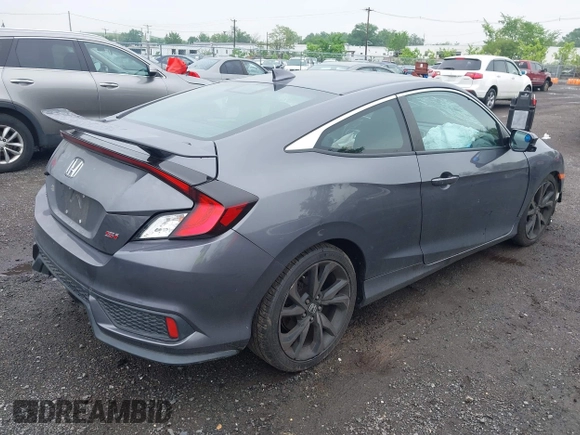2017 Honda Civic Si with VIN 2HGFC3A50HH752223, listed as a IAAI auction lot 42273886 with 76,454 mi miles and . Bid and sale history available at DreamBid. Image 4.