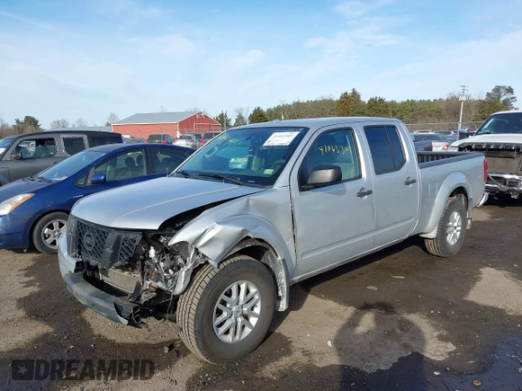 2014 Nissan Frontier SL z VIN 1N6AD0FV3EN767134, wystawiony jako IAAI lot #41463305 z przebiegiem 63 553 mil mil oraz . Historia ofert i sprzedaży dostępna na DreamBid. Obrazek 17.