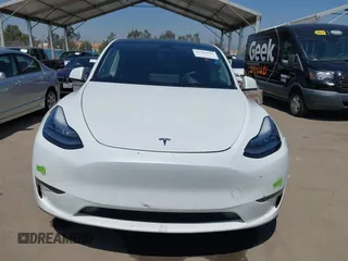 2023 Tesla Model Y Long Range z VIN 7SAYGDEE5PA104635, wystawiony jako IAAI lot #41989014 z przebiegiem 15 347 mil mil oraz . Historia ofert i sprzedaży dostępna na DreamBid. Obrazek 12.