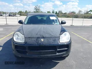 2004 Porsche Cayenne S with VIN WP1AB29P44LA75006, listed as a IAAI auction lot 41516951 with 119,828 mi miles. Bid and sale history available at carsss.com. Image 6.