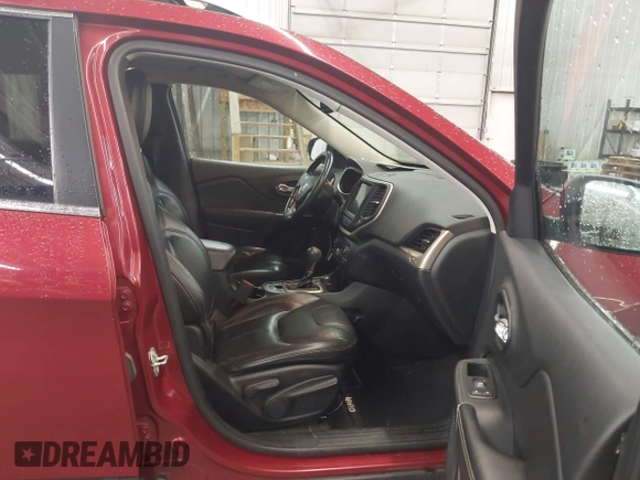 2016 Jeep Cherokee Limited with VIN 1C4PJMDB0GW337600, listed as a IAAI auction lot 42301911 with 163,441 mi miles and . Bid and sale history available at DreamBid. Image 5.