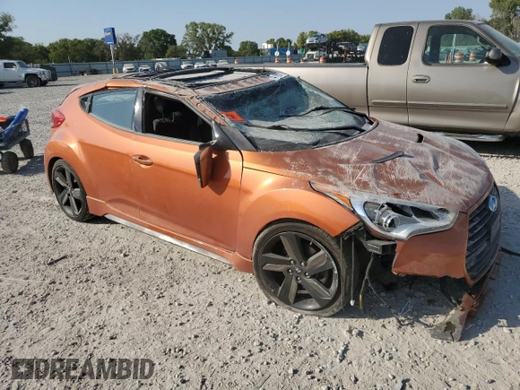 2015 Hyundai Veloster Turbo z VIN KMHTC6AE4FU232597, wystawiony jako Copart lot #74137024 z przebiegiem Nie podano mil oraz Szkoda całkowita • Salvage title. Historia ofert i sprzedaży dostępna na DreamBid. Obrazek 4.